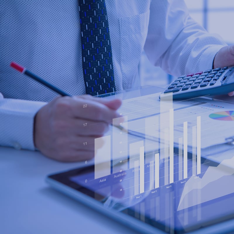 Business person viewing real life data that is coming off the page because it clearly shows key trends to follow